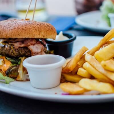 plate of Burger, fries and dipping sauce